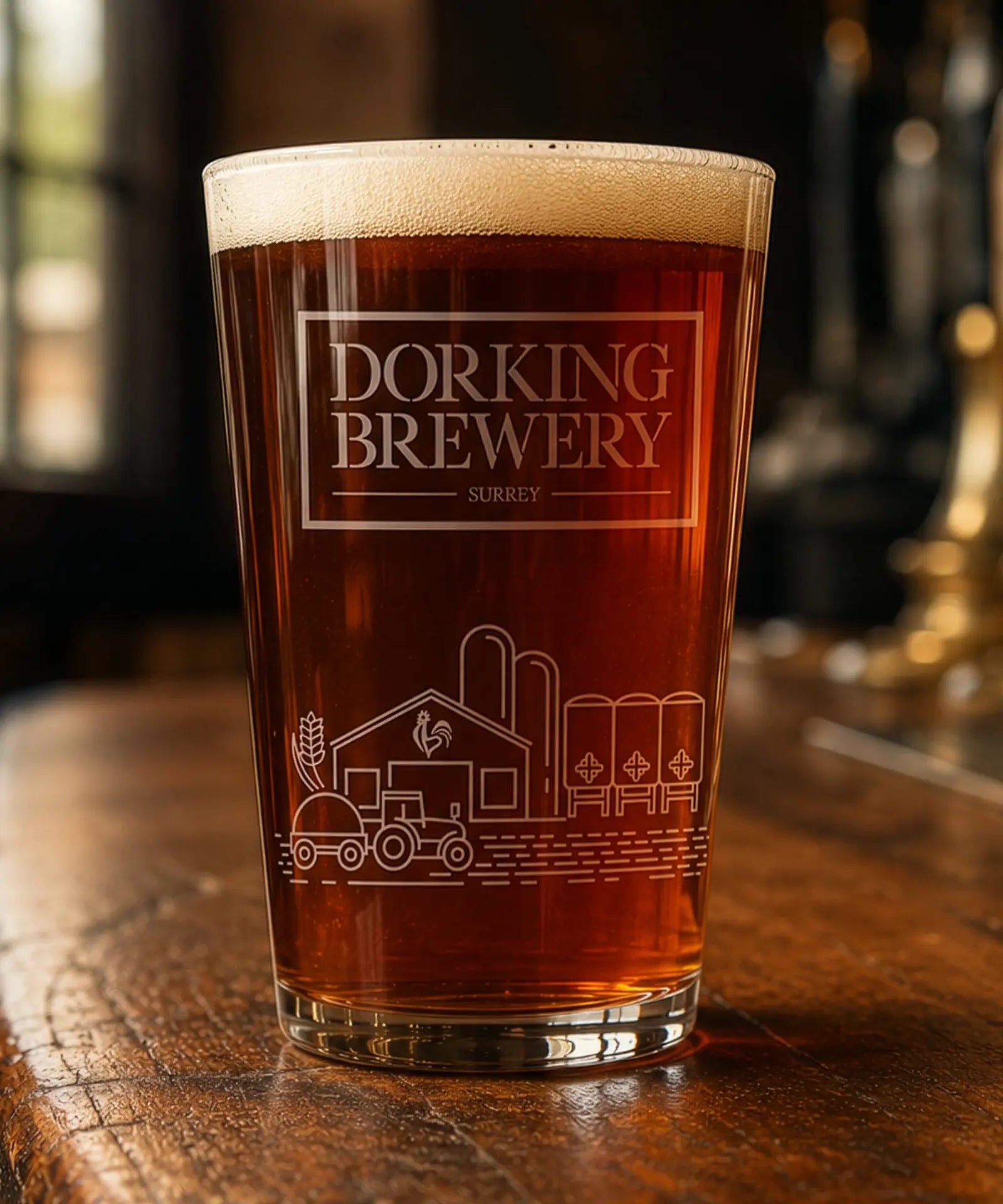 Pint of Dorking Brewery beer on a wooden surface with blurred background