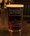 Pint of beer from Dorking Brewery on a wooden surface